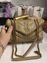 سان لوران • اكسسوار • راسل الصفحة