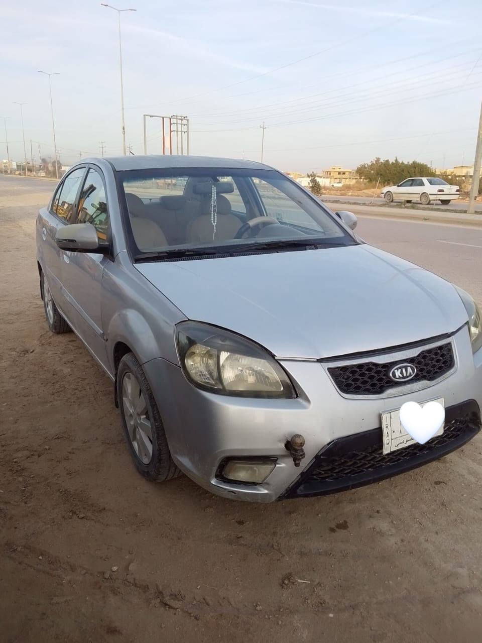 سلام عليكم كيه ريو موديل 12 خليجي دواخل صحراوي جام كهربائي محرك وكير جديد تبريد شغال كهربائيات كلهه شغاله باتري جديد تخم تاير السياره بيهه صبغ رقم بابل مشروع وطني  الاستفسار *********** بي واتساب
