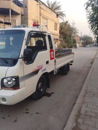 ام عيون قماره وربع قلاب موديل2002 رقم إنكليزي بغداد سنويه لل30 بسمي تح...