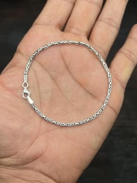 اساور فضة • مجال قليل