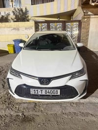 كورلا HEV 2025 رقم بغداد الجديد مرقم وجاهز فول مواصفات عده الكرسي الكه...