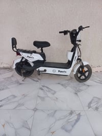 دراجة شحن • بانده • بطاريات جدد