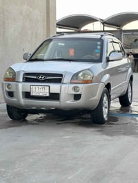 توسان 2010 • رقم بصره • ضربه وصبغ