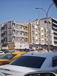 ساحة التحرير • عمارة الزهراء • ٥٠٢م