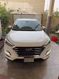 توسان 2020 لون ابيض رقم بغداد محرك 4 سلندر 2.0 دوش doch بيها بارد بالب...