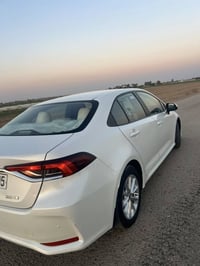 كورلا SAS اصل ياباني موديل ٢٠٢١ (بصمه + اسويج) (فتحه سقف ) رقم اربيل (...