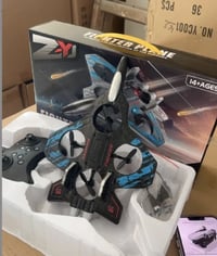 طيارة احترافية • ٤ محركات • ريموت عن بعد