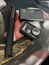 اكشن فايف من dji جديده استخدام قليل كومبو  تجي كيس شحن بطاريات ٣ بطاري...