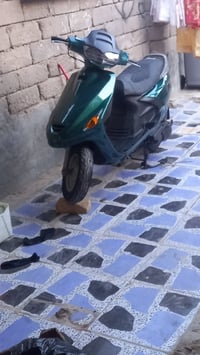 دراجة • حاويه • للبيع