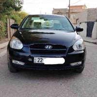 هيونداي اكسنت 2009 ضرر اربع قطع بابين خلفي وبوند وجاملخ  رقم جديد  كير...