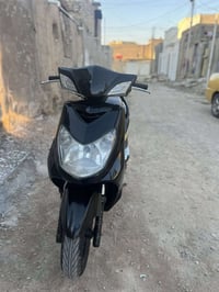 بغداد حي النصر • دراجة كابريتر • مكينة 58