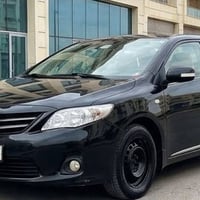 كورولا 2013 لون أسود قطِراني، وارد بلاد، مكينة كبيرة، القير والمكينة م...