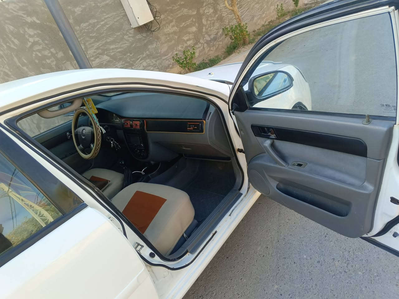 موديل 2005مصبوقه عام الجماليه بأسمي محرك مكفول وكيرعادي مكفوبات لاتنقيص ولاتبخير تبريد ثلج  تخم تايرجديدصدرامامي  خلفي رقم انكليزي بغداد هزه جديده سنويه إلى 29 العنوان ديالى الخالص الاسود السعر62 وبيها مجال رقم الموبايل *********** /***********
