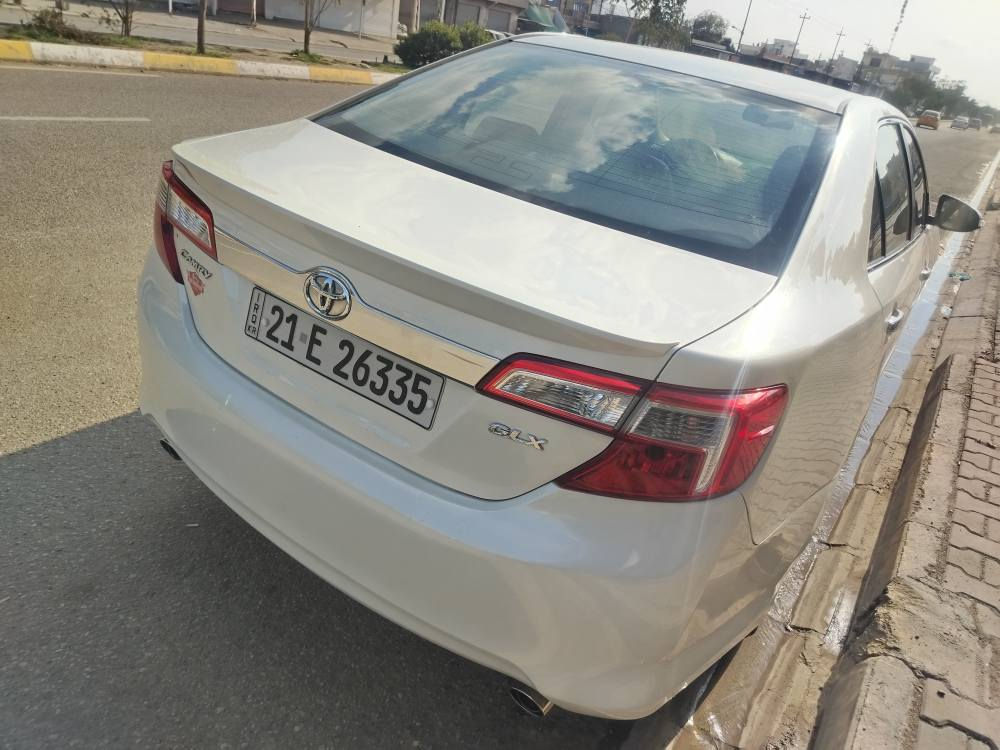 تويوتا كامري موديل 2014 فول مواصفات خليجي ماشي 157الف كيروالمحرك بشرط مامفتوح  تحويل والغرامه بشرط بيهه 5 قطعه  صبغ بدون دواخل مكان سيارة كركوك قادسيه شراي خابر *********** سعر128 كركوك, العراق
