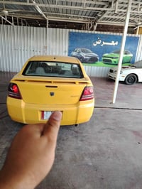 دوج أفنجر 2009 أمريكي البيع سعر 37 وبيها مجال عنوان بغداد سنويه ل27 كي...