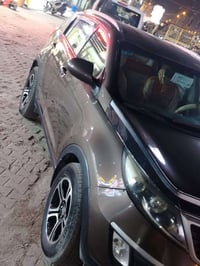 سبورتج موديل 2013   خليجي مابيه لابارد ولا صبغ بيه شخوط بابين السياره ...