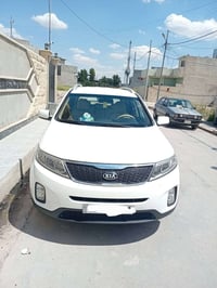 سيارة سورنتو 2014  رقم سليمانيه  محرك 4 سلندر  حجم 2400  7 راكب نظيفه ...