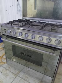 طباخ ٥عيون • نظيف • صينية تحتاج تعديل