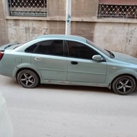 لاسيتي • ٢٠٠٢/٢٠٠٣ • موتور دهب