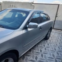 اوبتيما كوري • ٢٠٠٩ • محرك ٢٠٠٠