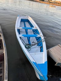 بلم فايبر كلاس مغلف بخشب للبيع الطول ٦ مترات العرض متر و٦٠ 07838518892