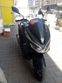 عارض دراجة نارية بيسي اكس جيل الثالث الدراجه رنبه وحلوه وجديده سعره 10...