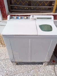 غساله هيتاشي مداخله تصليح.سعر70  /07735378489