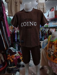 عالم الألبسة • مول الوردة الحمراء • ملابس