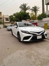 كامري 2023 SE للبيع وارد امريكي  هايبرد رقم بغداد تحويل مباشر  الداخل ...