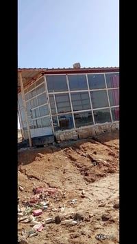 محل للايجار • مقابل محطة حسن عيسى • واجهة ٦ب٦