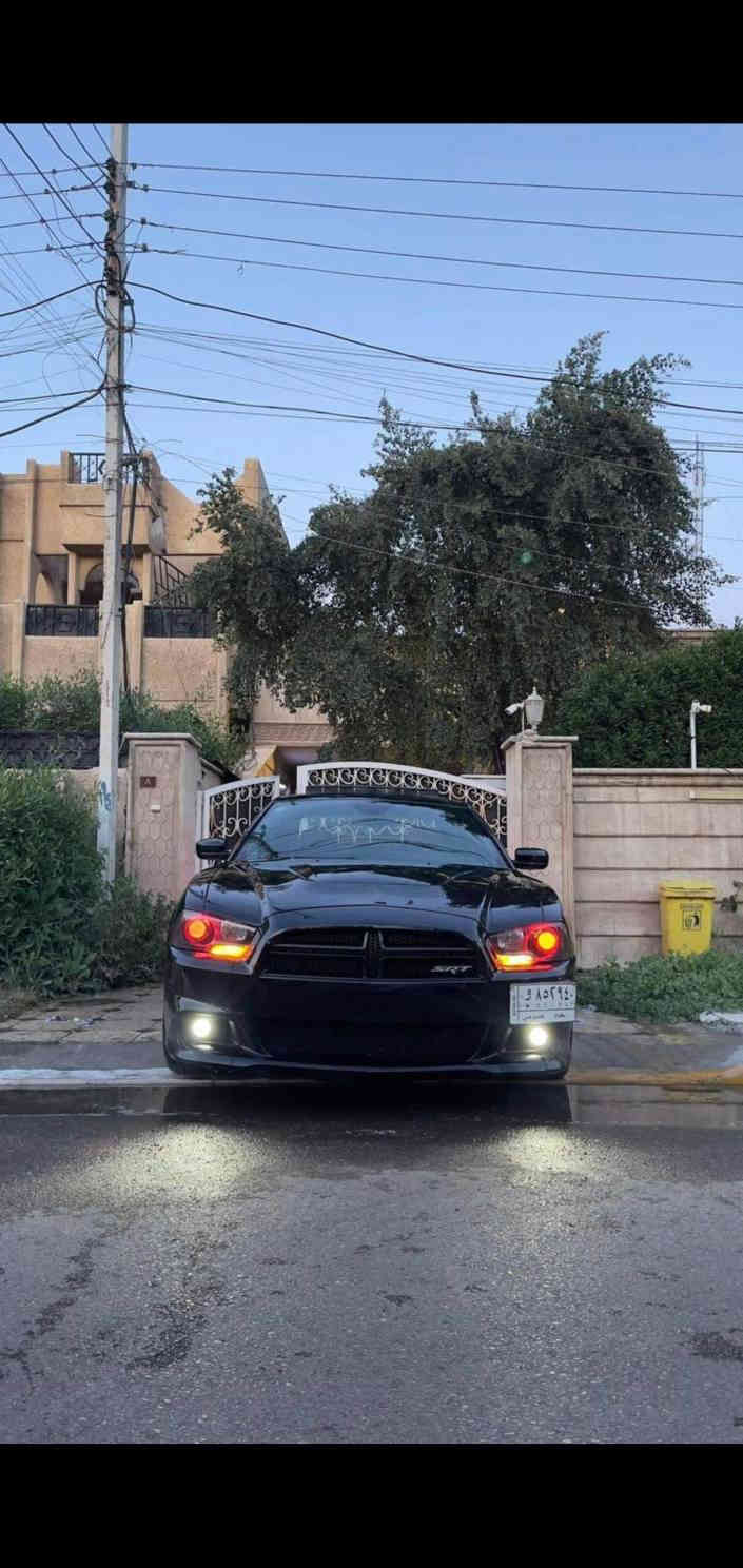 جارجر 2014  ار تي  فول  مواصفات لأخير  حادث جاملغ جهت السايق  بدون ايرباك او لغد او شاصي  السياره فول تزود من هوائيات وشوته رياضي وبنيد ابو الفتحه،? المكان بغداد الرقم ***********  رقم  بغداد تحويل مبآشر السعر 150$ وبيها مجال السياره نظيفه بدون اي نقص بغداد
