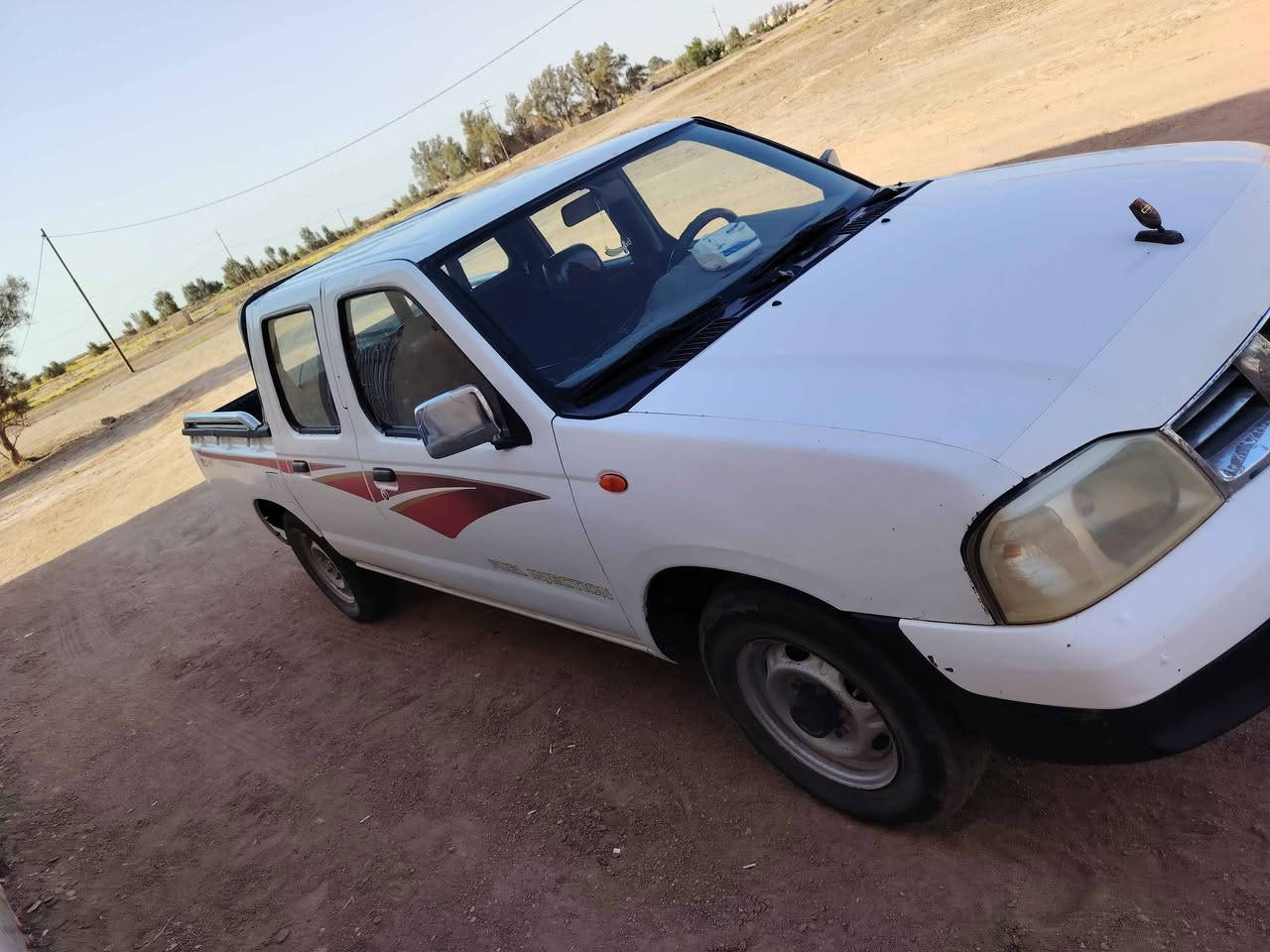 سيارة نيسان لبيع مكفوله كفاله عامه من الصبغ بيه بس لي مشره بربع الاخير مال  جاملغ الخلفي رقم بغداد بسمي تحول ثاني يوم التواصل على الرقم ***********الرقم الثاني وتساب *********** السعر 118 وبيه مجال ديوانية, القادسية
