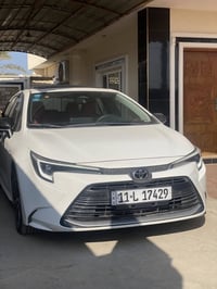 كورلا هايبرد تجميع صيني شكل الامريكي السيارة موديل 2024  السيارة مكفول...