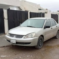 لانسر • ٢٠٠٩ • كويسينجاك