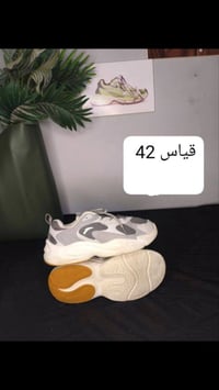 اي قطعة • ملابس • للبيع