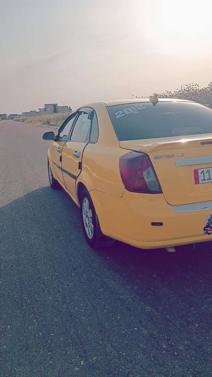 سلام عليكم للبيع سياره اوبترا تكسي🚕 2012 كير عادي من الشركه التاكسي كير ومحرك كله شرط تبريد تدفيه غرامات وهيئه مصفر ثانويه لحد 2031 سياره الشرطه الوكاله وتحويل الاستفسار يرجى اتصال الرقم✅ السعر 62 بمجال *********** رقم اللوحه بغداد مسطره مكاني تلعفر

