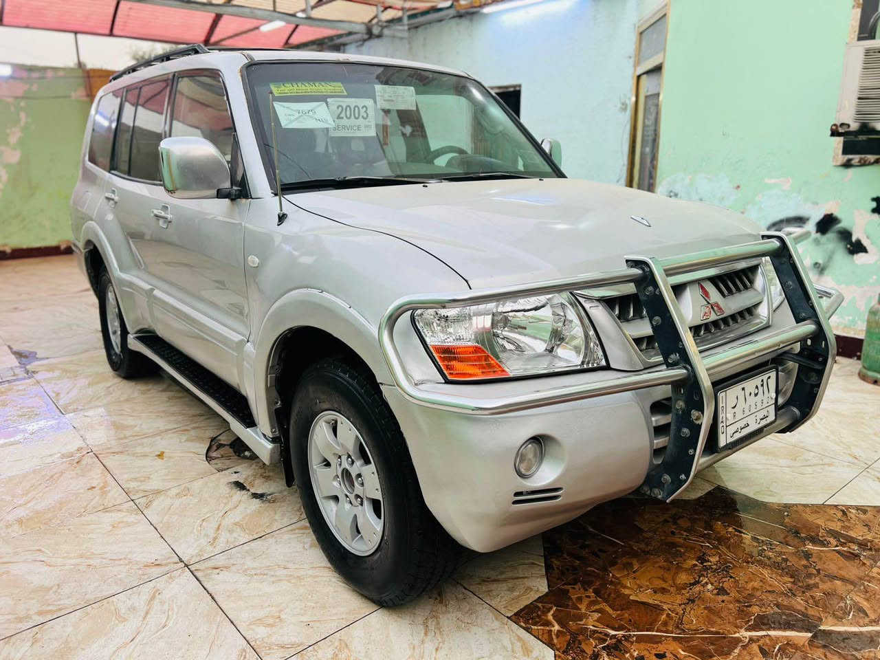 السلام عليكم للبيع باجيرو موديل 2003 رقم بصره مشروع وطني تحويل ثاني يوم سياره مكفوله من الكصه والنقل الجثه والضربه والكلبه والعيب الشرعي مكينه وكير اوتماتيك بلاد جدد حداده طخم تاير ويلكب جدد تبريد شغال سياره جاهزه وجديده السعر 79 ورقه الاستفسار الرقم ‏‪  ***********‬‏ مكان السياره البصره البصرة, العراق
