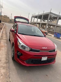 ريو أمريكي 2023 فول مواصفات ✅️بصمه وفتحة سقف  ✅️رادار  ✅️شاشة وكامرة خ...