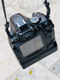 نيكون D5200 • شتر ٢٠٠٠٠ • عدسة ٥٥مم