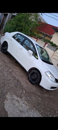سياره البيع نيسان تيدا محرك و كير ما بي عيبه تايره ٤ جيديد تبريد فول س...