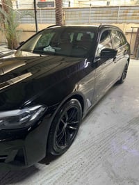 بي ام دبليو • 520i