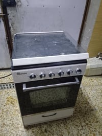 طباخ للبيع اربع عيون شغال مجمده شغال مقعد مال اطفال 07730884993