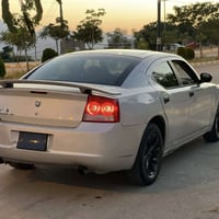 دۆچ چارجەر V6 3.5  مۆدێل2008 سەیارەکە موسە چوار جام کارەبا شاشە ئایپات...