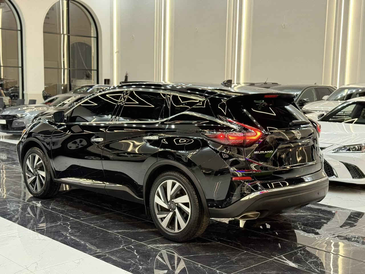 𝟐𝟎𝟐𝟑 𝐍𝐈𝐒𝐒𝐀𝐍 𝐌𝐔𝐑𝐀𝐍𝐎-𝐒𝐋.𝐀𝐖𝐃 (كيلن تايتل)

نيسان مورانو (SL.AWD) موديل : 2023

السعر : 195$

اللون : اسود

عداد المسافة : 

حجم المحرك : 3.6L V6 ( 6,سلندر )

✅ کلین تایتل مکفولة كفالة عامة ✅

المواصفات : 𝐒𝐋.𝐀𝐖𝐃

فول فول مواصفات 1/1

فتحة سقف بانورما
دەبل اکسل (𝐀𝐖𝐃) 
 بصمة ابواب 
بصمة تشغيل 
تشغيل عن بعد :
شاشة کبیر لمس
شحن وايرليس
كاميرا °360
‏‎كاميرا امامي
كاميرا جانبي
كاميرا خلفي
اوتو ستارات (𝐀𝐔𝐓𝐎 𝐒𝐓𝐀𝐑𝐓)
اوتو ستوب (𝐀𝐔𝐓𝐎  𝐒𝐓𝐎𝐏)
رادار امامي (تحديد مسار)
رادار جانبي  (نقاط عمياء)
رادار خلفي (التحذير من الاصطدام)
حساسات امامي
حساسات جانبي 
حساسات خلفي 
نظام (𝐄𝐂𝐎)
نظام (𝐍𝐎𝐑𝐌𝐀𝐋)
نظام (𝐒𝐏𝐎𝐑𝐓)
كشنات جلد
كشنات كهربائي
كشنات خزن+ميموري
كشنات هیتر
تحكمات استيرن
استيرن هیتر
تبريد لمس 
تبريد مركزي 
صندوق شفط كهربائي 
لايتات 𝐋𝐄𝐃 عدسة زينون بيلادي
بلاجيكتور  𝐋𝐄𝐃 بيلادي
بكلايتات 𝐋𝐄𝐃 بيلادي
ويل كروم 

بعد هواية مواصفات…

‏‎تفاصيل اكثر الاتصال علی ارقام التاليه ‏

☎️ ***********

☎️ ***********

‏‎عنوان📍اربيل فرع ناقلات

معرض كاليفورنيا كارس CALIFORNIA Cars
