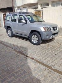 نيسان اكس تيره موديل ٢٠١٠ مصبوغه احزام بيهه طخه خفيفه بل مازده الامامي...