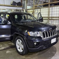 عامل غسيل سيارات • محطة قمة بغداد • شارع الخدمي