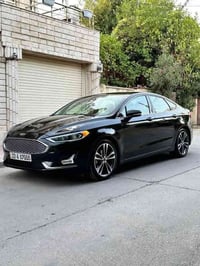 فورد فيوجن  تيتانيوم 1/1 موديل 2019 مكينه 2000 تيربو  ماشية 97 الف ميل...