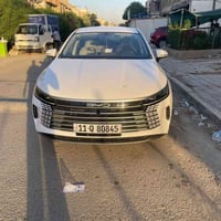 بي واي دي دستروير موديل 2025لون ابيض رقم بغداد ماشيه 12الف تصال 077353...