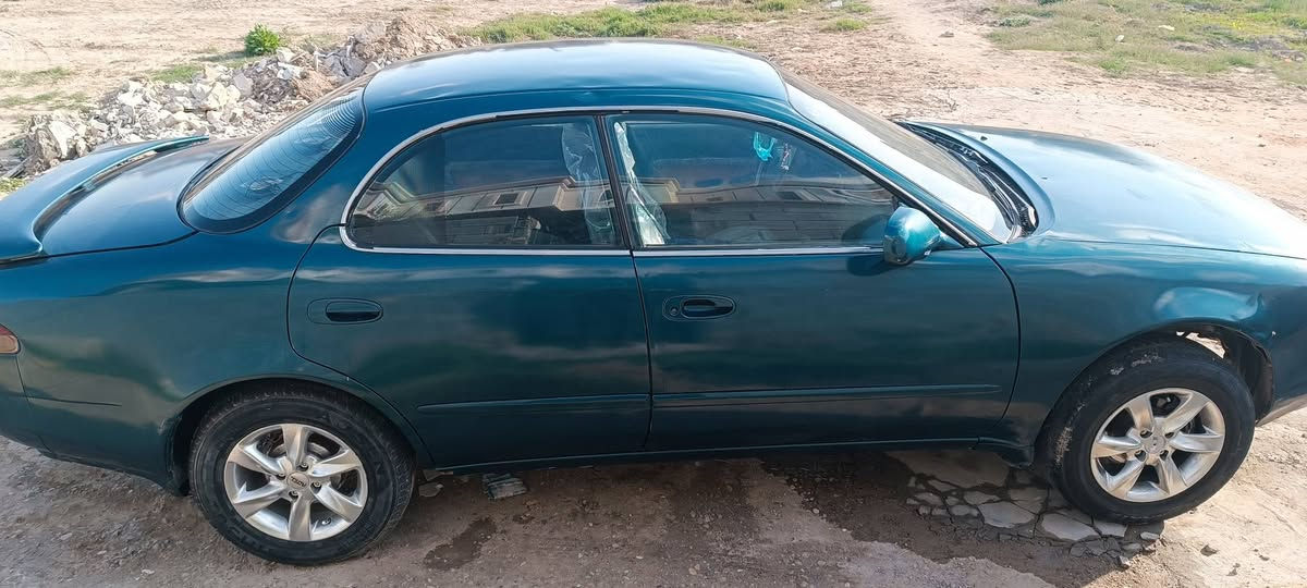 توتوتا كورلا  موديل 1992  محرك جديد كير اوتو  جديد صدر  جديد بيع او  مراوس *********** عنوان الرمادي
