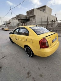 اكسنت • ٢٠٠٩ • ضربة خلفية